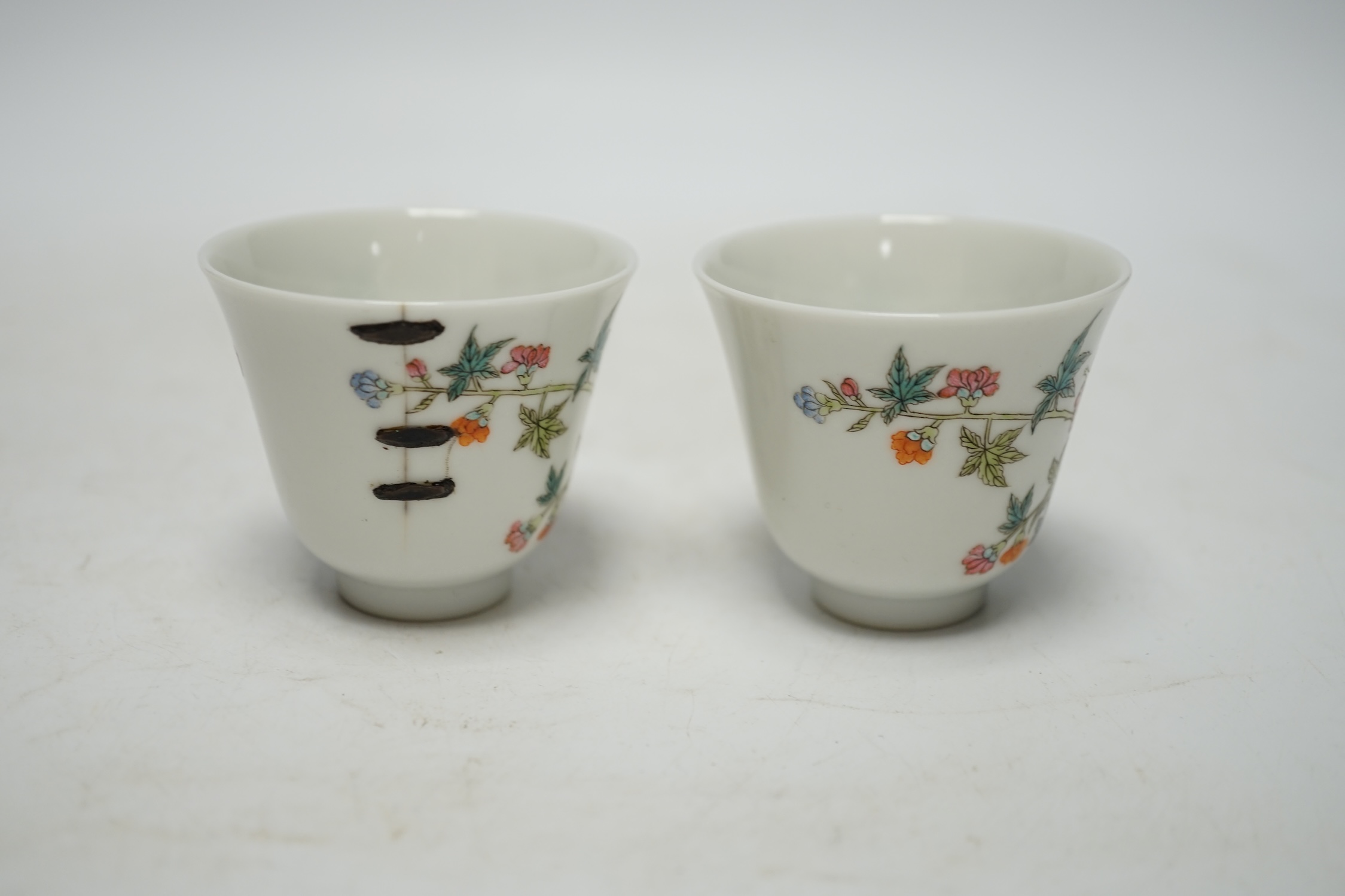 A pair of Chinese porcelain wine cups, 5.3cm high